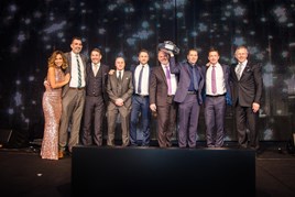 Sinclair Group representatives collect their Mercedes Benz Retailer of the Year award
