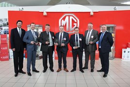MG Motor UK head of sales and marketing, Matthew Cheyne (far right) with the brand's award-winning car dealers