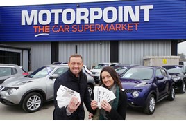Gem 106 Breakfast Show presenters Sam and Amy at Motorpoint Derby