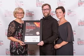 Ryan Forsythe, marketing manager, John Mulholland Motor Group and his wife Jennifer Forsythe (Right) receive the award from Diane Birch, executive director, British & Irish Trading Alliance