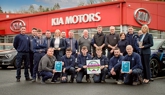The Roadside Garages Kia team celebrate their Star of the Year award from the Motor Ombudsman