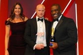 Richard Gough, general manager, Mercedes-Benz of Preston, accepts the award from Andrew Landell, managing director, LTK Consultants, right, and Lisa Snowdon, left