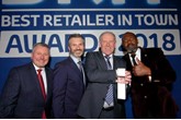 BRiT winners (from left): Mark Roden, operations director of Toyota (GB) plc; Paul Van Der Burgh, president and managing director of Toyota (GB) plc; Kevin Slack, managing director of Ron Brooks; and presenter Lenny Henry