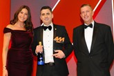 Russell Borrie, group franchise  director, Arnold Clark Automobiles,  accepts the award from Martin Ward,  managing director, Autoclenz, right and host Lisa Snowdon, left