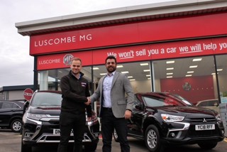 Sam Luscombe (left) welcomes Soteris Neophytou to the Luscombe Motors team