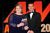 Sarah Eccles, group fleet sales director, Swansway Group (left), accepts the award for Best Fleet Operation from Stephen Briers, editor-in-chief, AM
