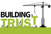 Crane carrying the words 'building trust'