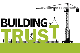 Crane carrying the words 'building trust'