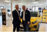 Simon Hetherington, commercial director at Kia Motors UK, with Glen Demetrioff, RAPID RTC's president and chief executive