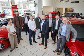 The team from Snows Motor Group celebrate their BRiT award win from Toyota GB