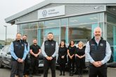 Steven Kirby (front right), head of business at Volkswagen Grimsby, with Will Munro (front centre), JCT600’s brand operations manager, and the team at Volkswagen Grimsby