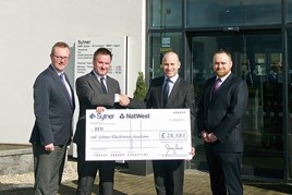 Synter's BEN donation (left to right): Picture  attached: Keith Weaver, Sytner buying manager, Gary Wigginton, head of partnership development at Ben, Darren Edwards, Sytner chief executive and Sebastian Birmingham, Sytner's SEA manager