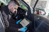 Technician completing a car MOT