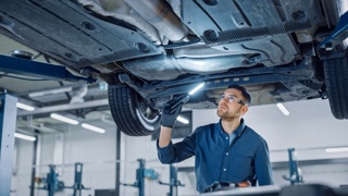 technician working on car