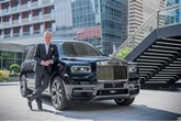 Torsten Muller-Otvos, Rolls-Royce Motor Cars chief executive, with a Rolls-Royce Cullinan