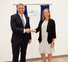 TrustFord acting chairman and chief executive and finance director Stuart Mustoe with Mandy Dean, director of commercial vehicles, Ford of Britain and Ireland