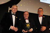 TrustFord chairman and chief executive, Stuart Foulds (centre), receives the Fleet News Fleet Dealer of the Year award