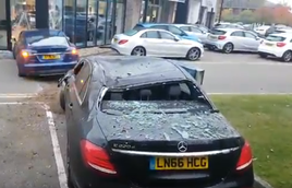 video aftermath of flying tesla colliding with mercedes at a hertford dealership